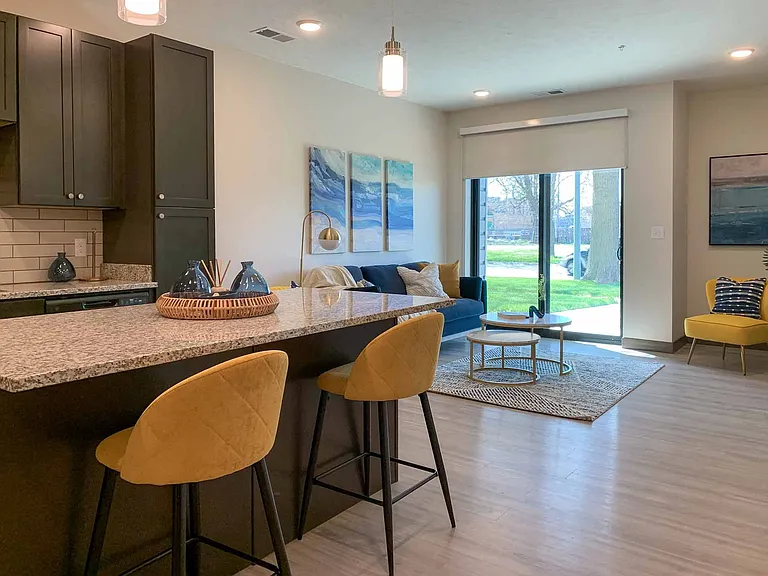 The living room of our model 1-bedroom Marble floor plan.