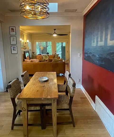 Dining room opens up to kitchen, living room and stone patio
