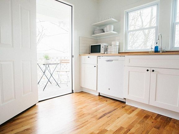 Kitchen and door leading to deck