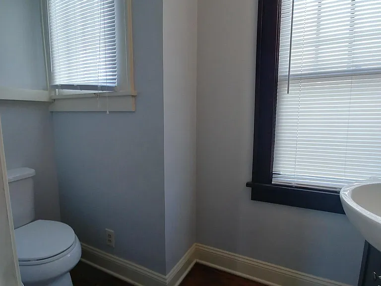 1/2 bath off living/dining room.