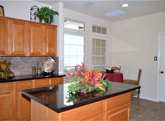 Kitchen offers large island with eat up area.