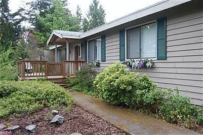 2,312 sq feet on 1.1 acres. Room to spread out!