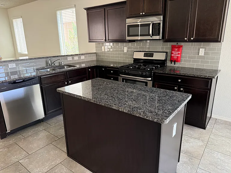 8927 Warm Wind Pl NW — Photo 7