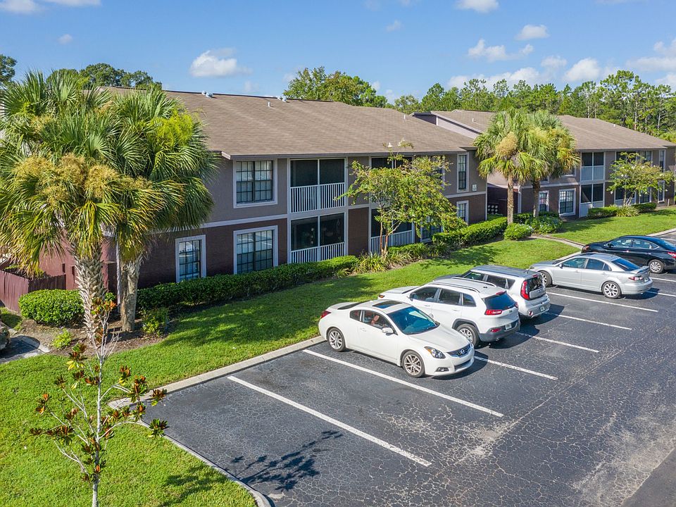 Ample parking and lush surroundings.