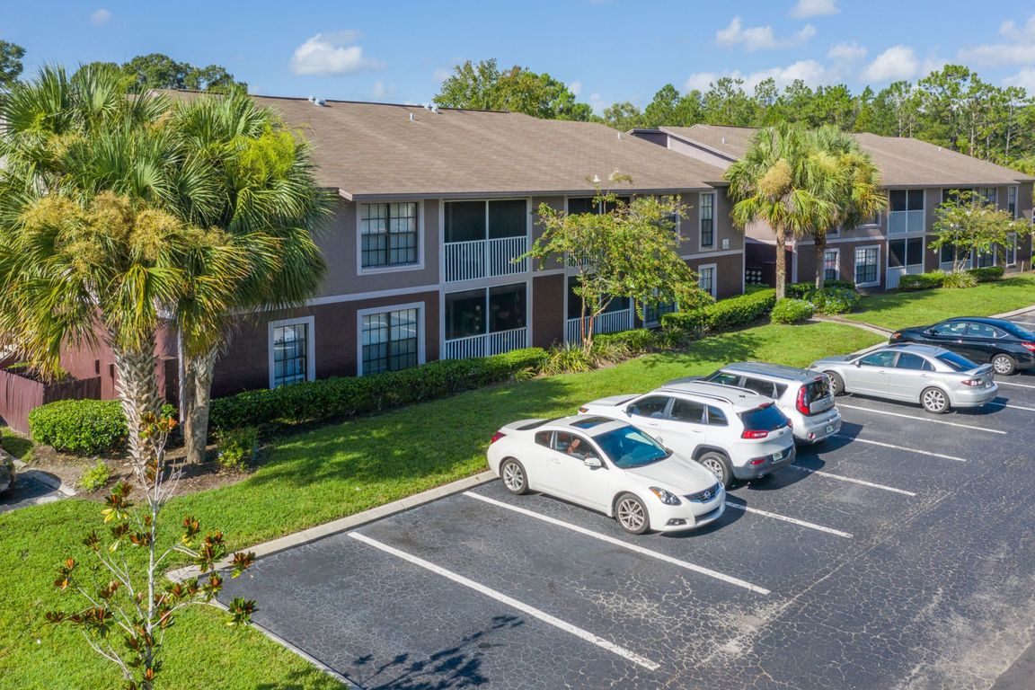 Ample parking and lush surroundings.