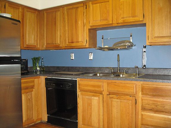 Kitchen - Lots of counter space, double sink, refinished cabinets