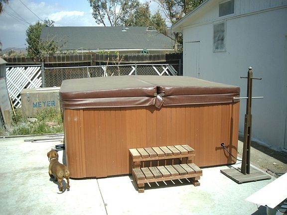 BACK YARD AND PATIO WITH JACUZZI 