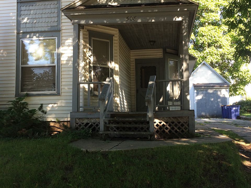 Inviting home with large patio, driveway, shed, and small ba