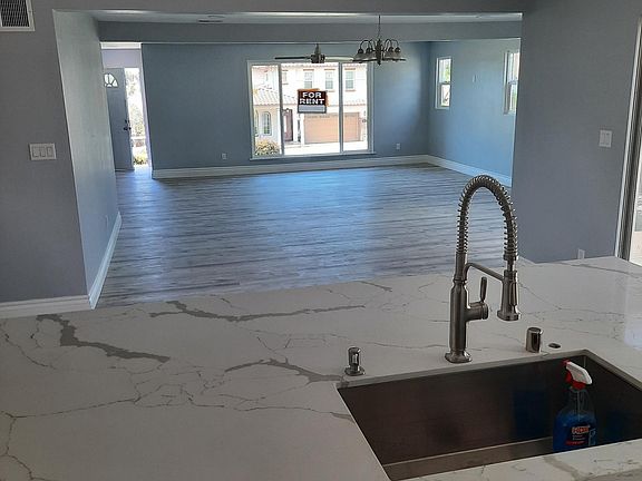 Open plan connecting the kitchen to the living area.