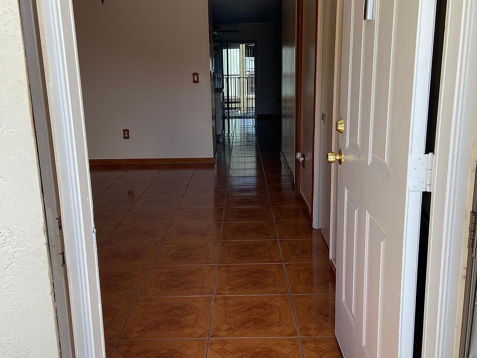 Entrance / Living room, dining area, half bath, laundry, closet