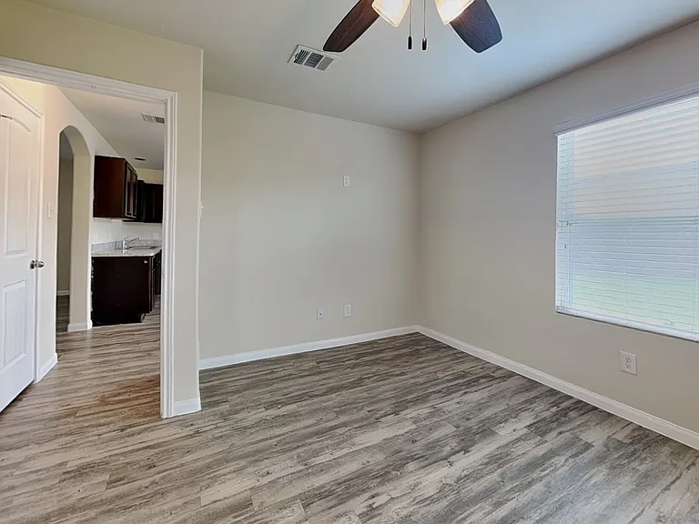 Spacious bedroom with neutral