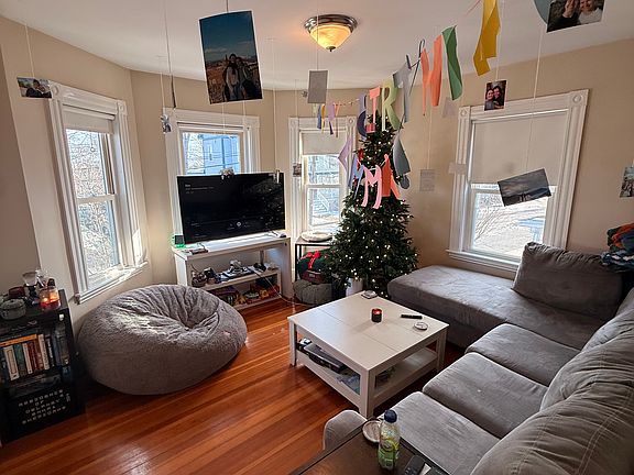Living room with bay windows