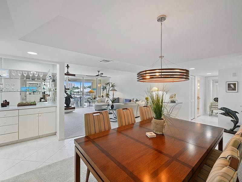 View of dining/bar/living area.