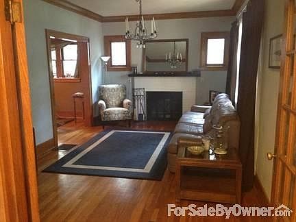 Family Room w/Fireplace
						:
						Hardwood floors throughout