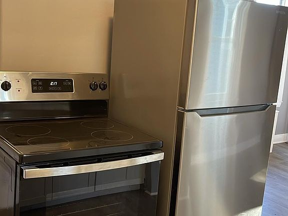 Brand new stainless steel appliances.