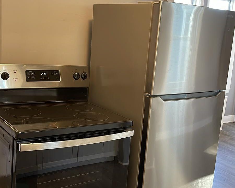 Brand new stainless steel appliances.