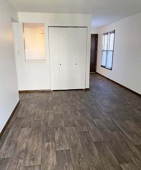 View of family room and hall closet from the balcony.