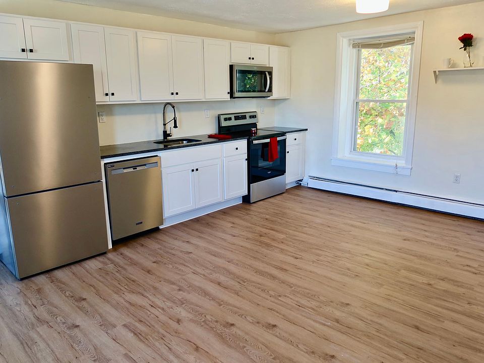 Newly-renovated Kitchen - New cabinets, stainless steel appliances, granite countertops, and flooring.