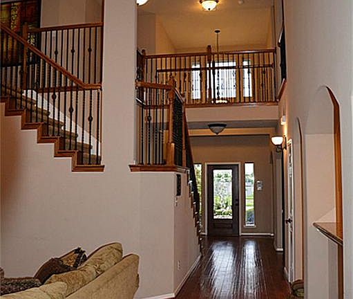 Grand entry with  leaded front glass entry door.