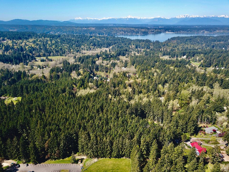 10 Acres zoned 1 home per 2.5 acres. Strawberry Hill Park in the foreground. High School Rd is to the L. See survey for accuracy