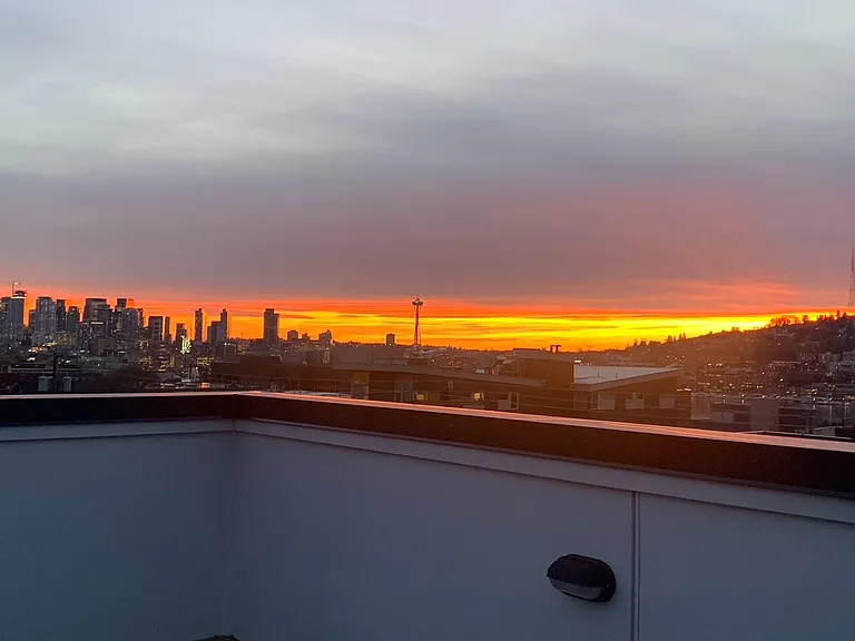 View of the Seattle skyline and Space Needle from the rooftop deck