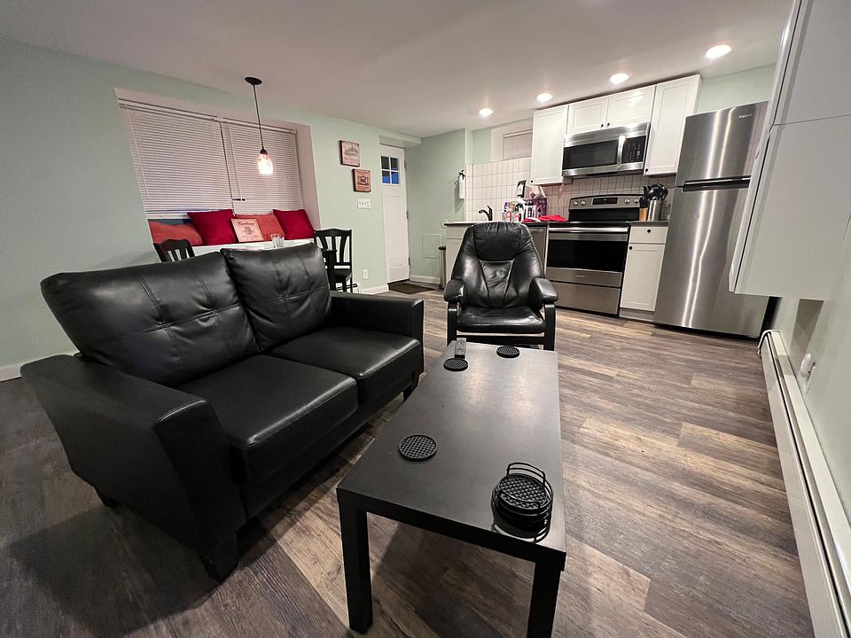 Beautiful, modern open-concept kitchen/living/dining area.