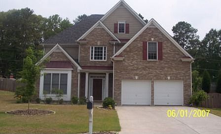Brick front with hardiplank siding