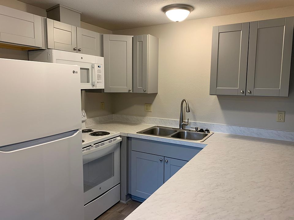 Kitchen with brand new appliances and modern cabinets.