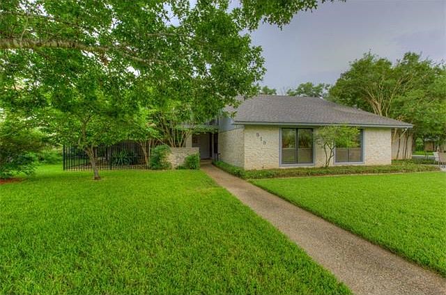 515 Sara Dr. sits on a deep, quarter-of-an-acre corner lot with mature trees