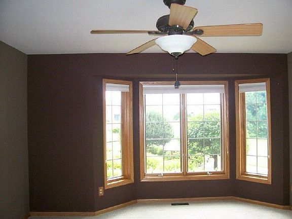 Formal dining room with bay window
