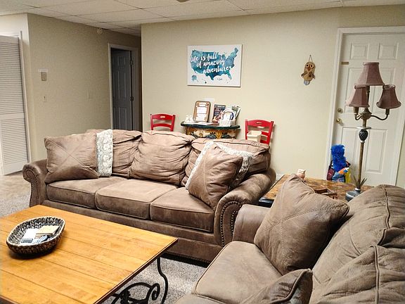 Cozy couch and love seat with coffee table