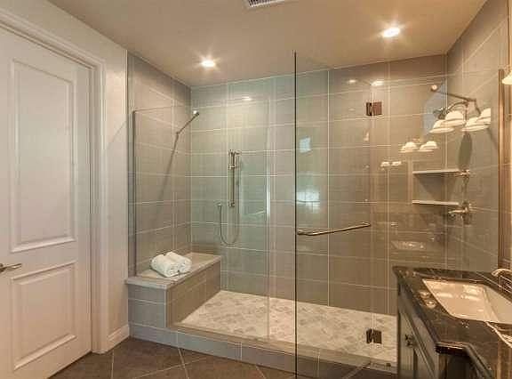 Downstairs Master shower...This double shower offers Plenty of ELBOW ROOM!