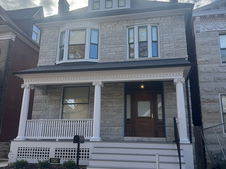 Stunning new covered front porch, historic dentil preserved with new columns, capitals, and composite decking and stairs. New stained front door custom-milled to match historic door.