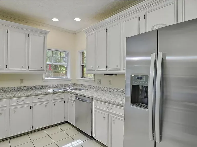 Corner kitchen sink. Lots of cabinets!!
CUTE, CUTE!! New refrigerator and dishwasher