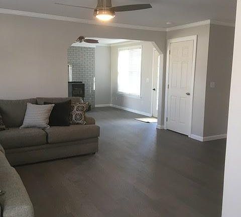 Large living room with view of front room