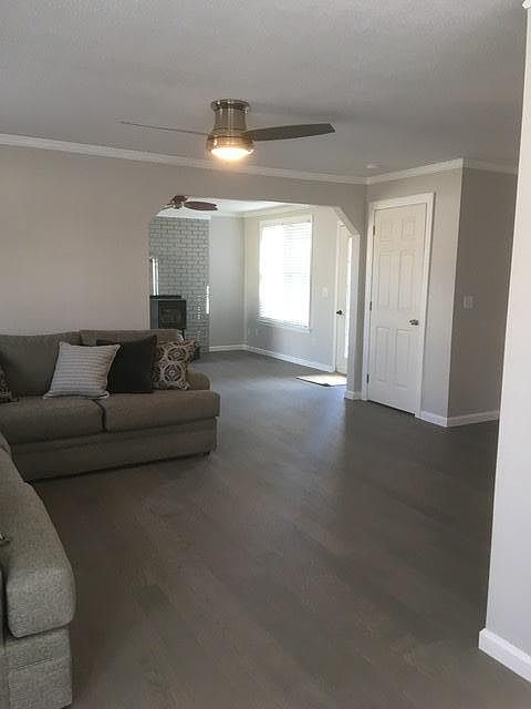 Large living room with view of front room