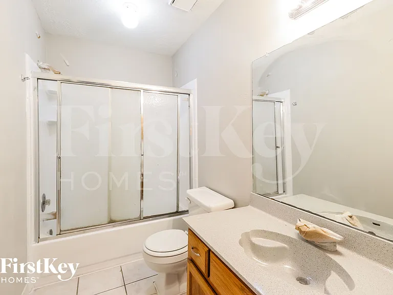 7447 Woodland West Dr — Photo 13