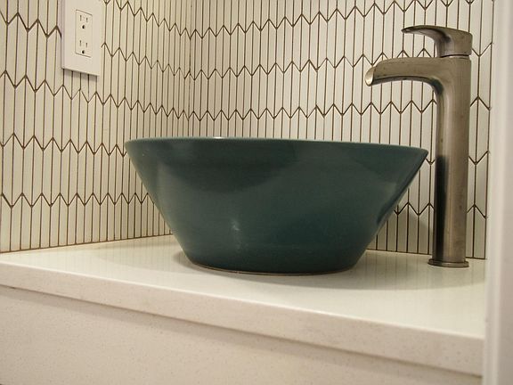 Vessel sink in powder room