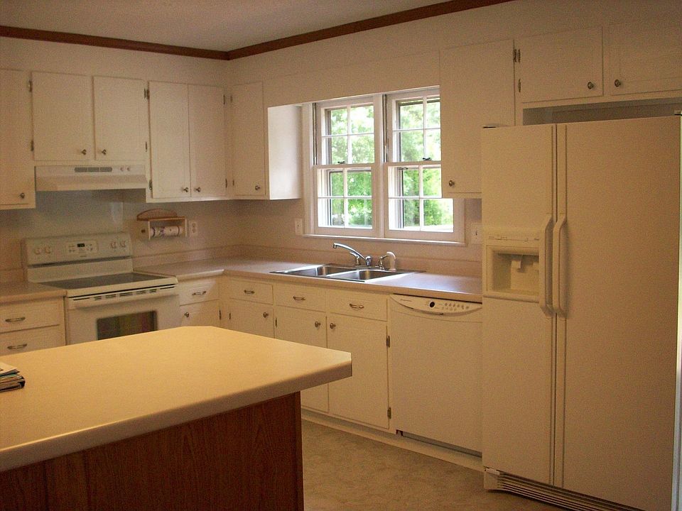 view of kitchen from den area