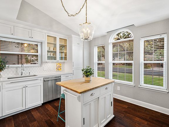 Fully stocked kitchen with island bar