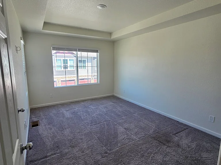 Master Bedroom with plenty of space for king size bedroom set and more.