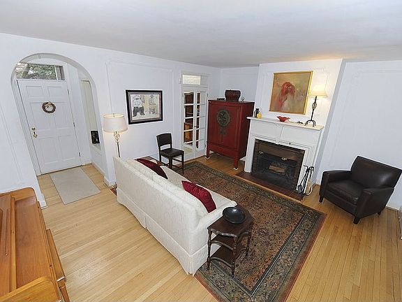 Living Room with wood floors and fireplace