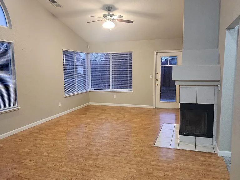 Large family room area with celling fan