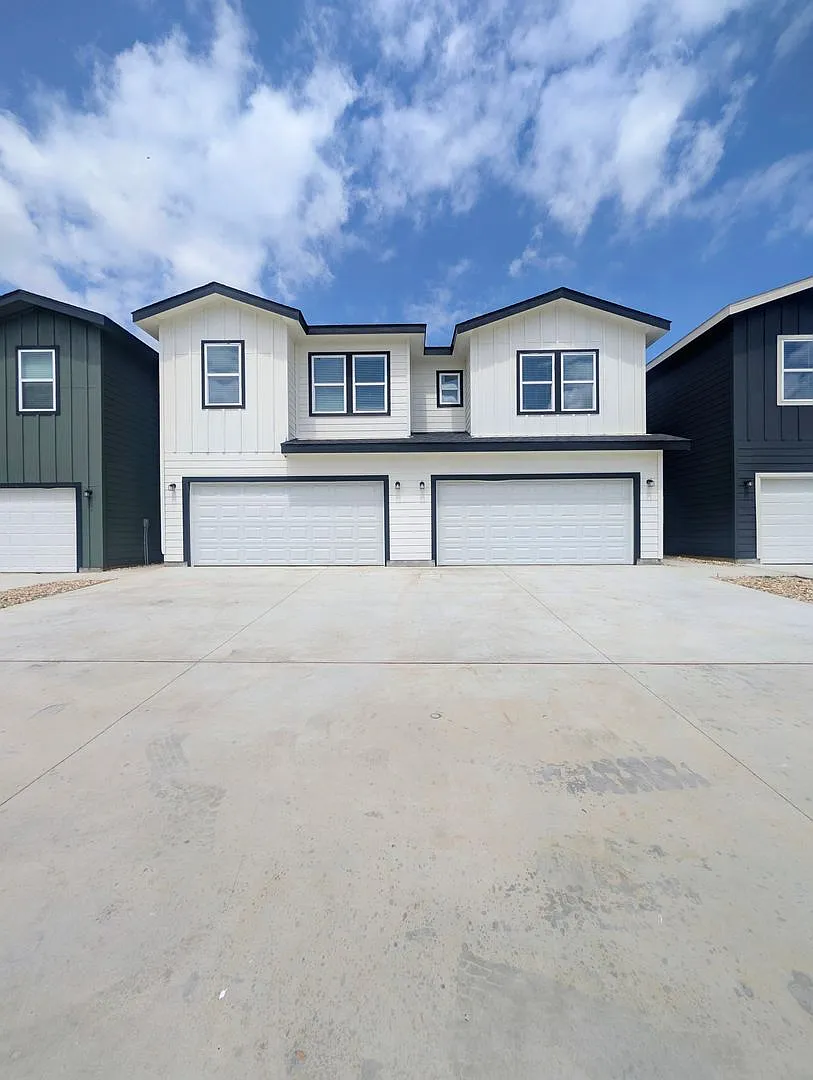 Brand New Duplex in New East Parks Community — Photo 1