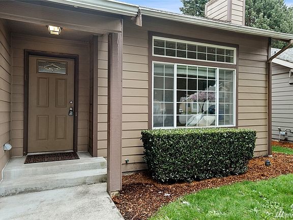 A covered front entry shelters packages or guests from the elements. 