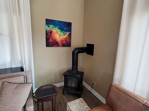 Gas fireplace in Living area. (Furniture and art not included)