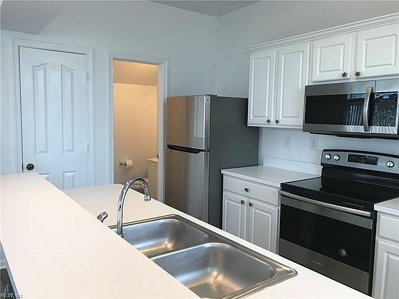 KITCHEN VIEW FROM DINING AREA.