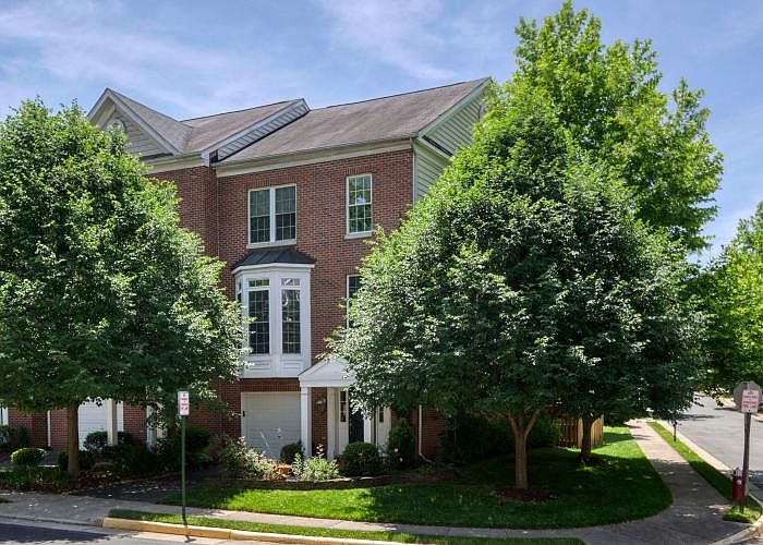 End unit townhome, built in 2003, 1 car garage, covered entry.