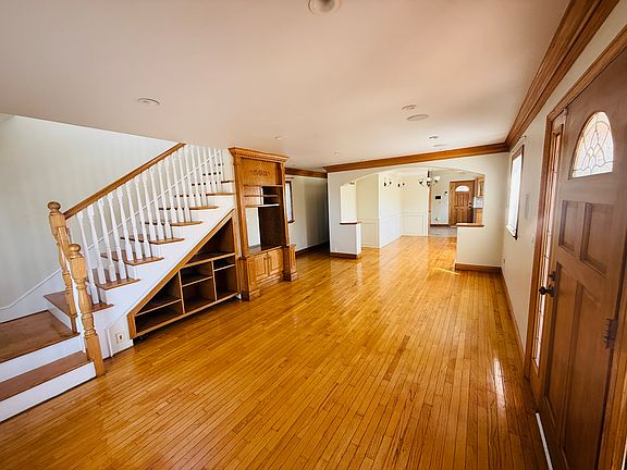 view of stairs and living room