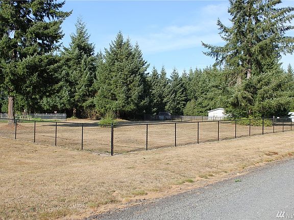 Along the front of property is the large fenced area.  Some timber for shade and privacy makes this setting a little park like